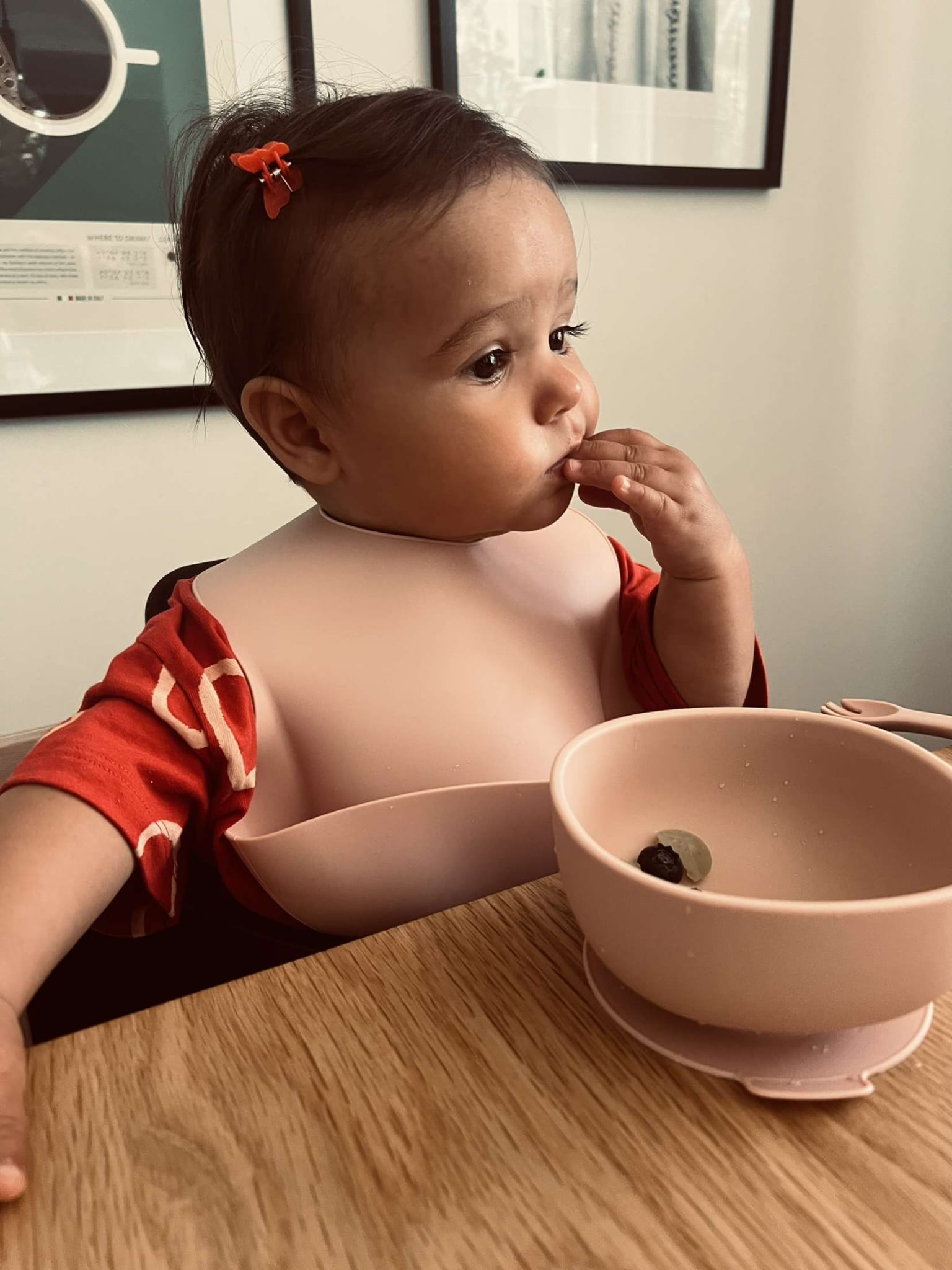 Toddler eating at table